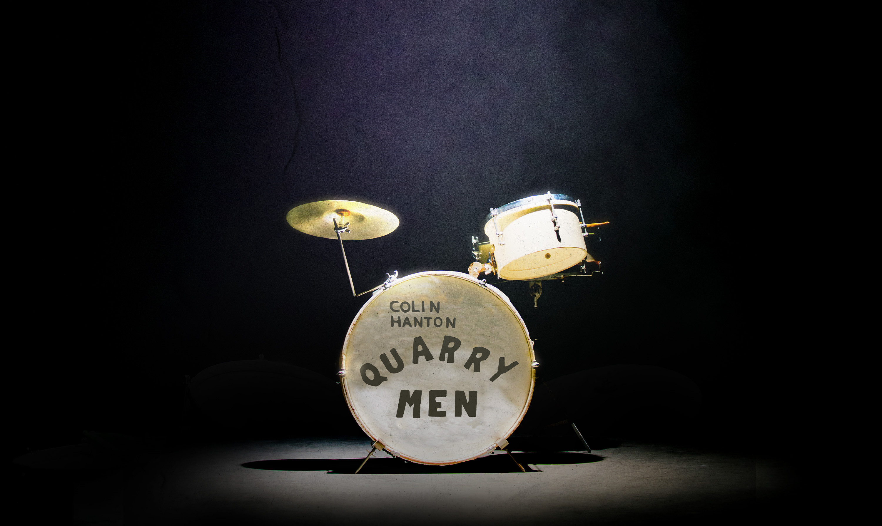 Drum set. Large drum reads 